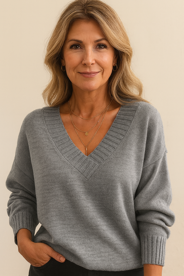 Stylish women's ribbed v-neck sweater. Relaxed fit long sleeve, a must-have for fall/winter fashion.