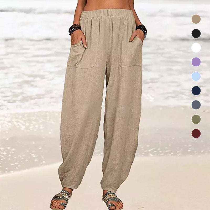 Side view of Rizza women's wide-leg beach pants, emphasizing the relaxed fit and comfortable silhouette.