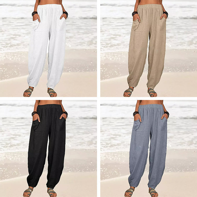 Women's Rizza relaxed fit beach pants, worn while lounging, embodying comfort and casual summer style.