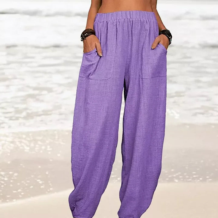 Rizza women's wide-leg beach pants paired with a summer top, ideal for vacation style and casual wear.