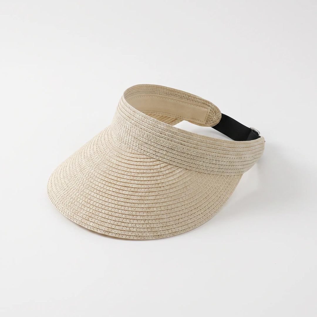 Women's roll-up sun visor with wide brim, great for travel. Excellent sun protection for beach or daily wear.