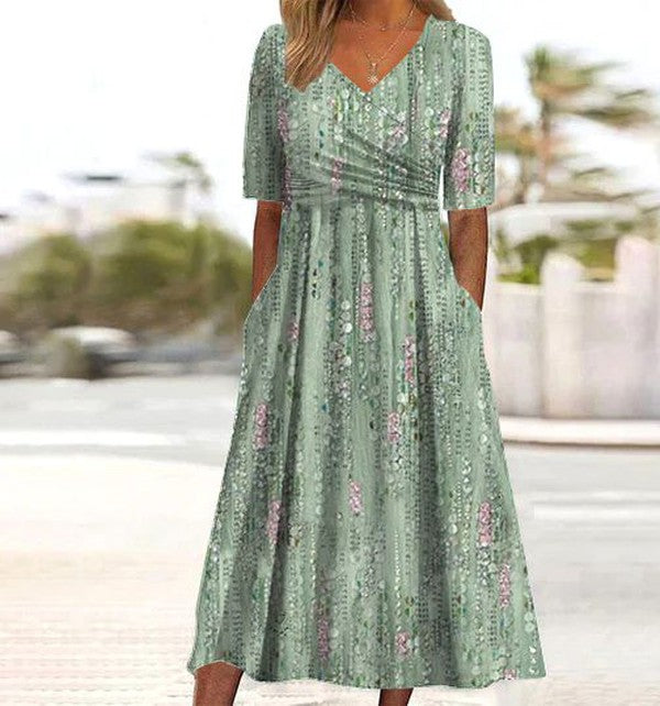 Women's romantic floral A-line midi dress with short sleeves & V-neck, perfect for summer & elegant occasions.