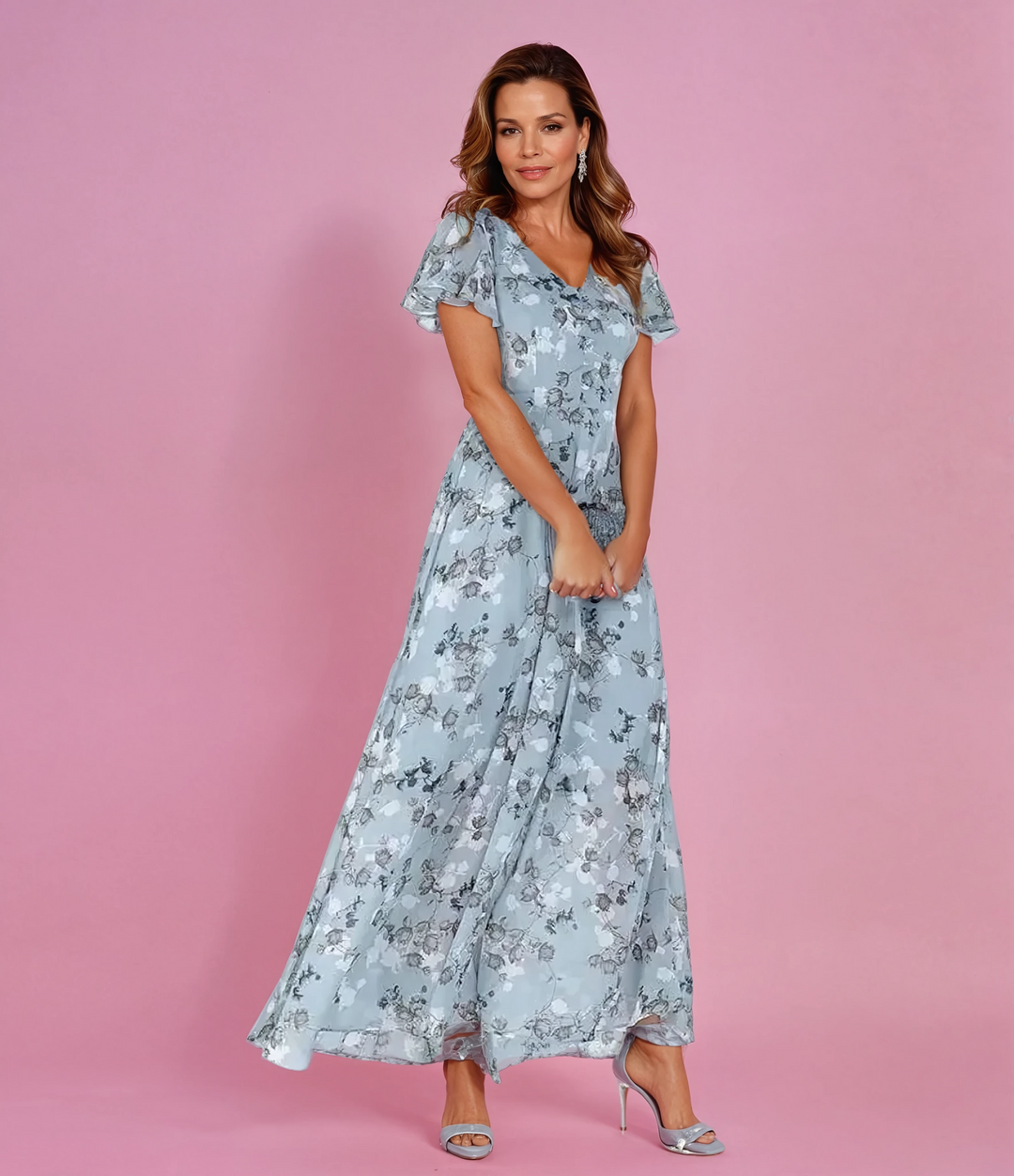 Women's romantic floral maxi dress with elegant flutter sleeves & v-neck. Ideal for summer parties & vacations.