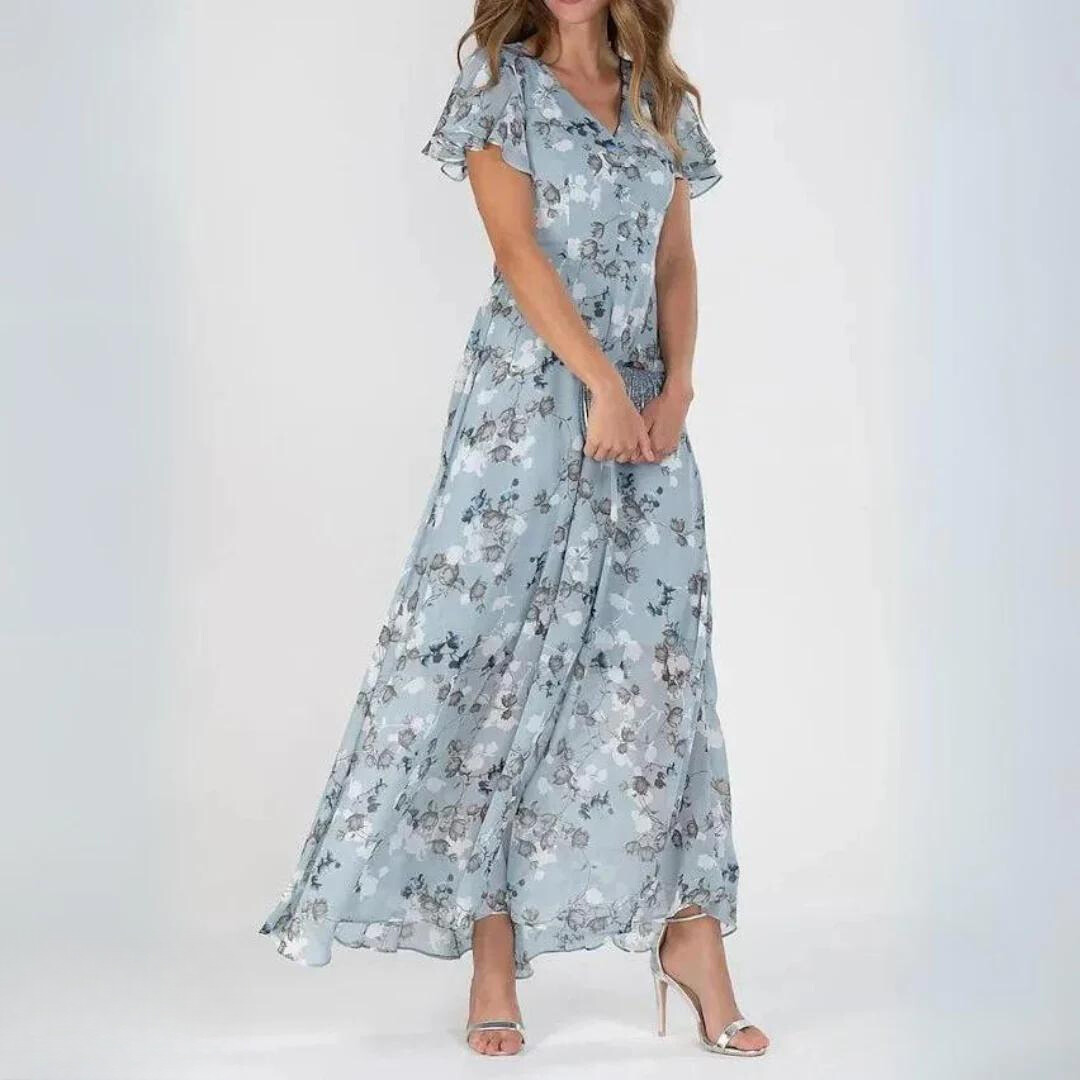 Feminine long floral maxi dress for women, featuring charming flutter sleeves & v-neck. Ideal for events & summer.