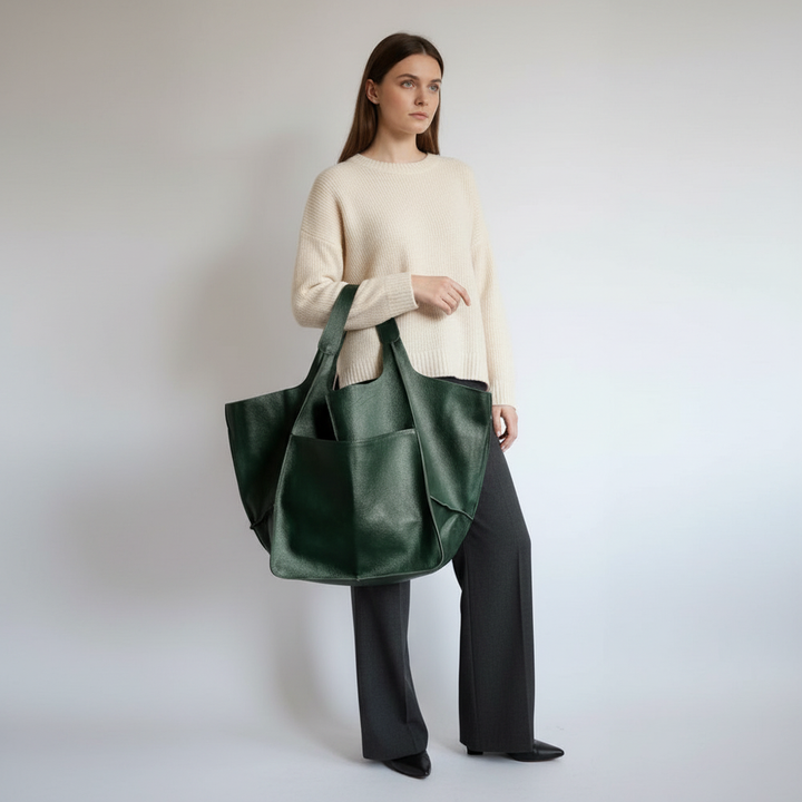 Large women's vegan leather work tote bag. Spacious, chic, and ethical everyday shoulder bag.