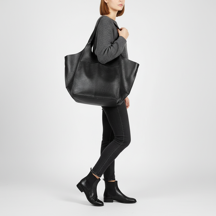 Women's roomy faux leather everyday tote bag. Spacious, chic, and an ethical fashion statement.