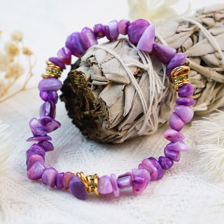 Women's Red Jasper natural stone crystal bracelet. Grounding healing gemstone fashion accessory.