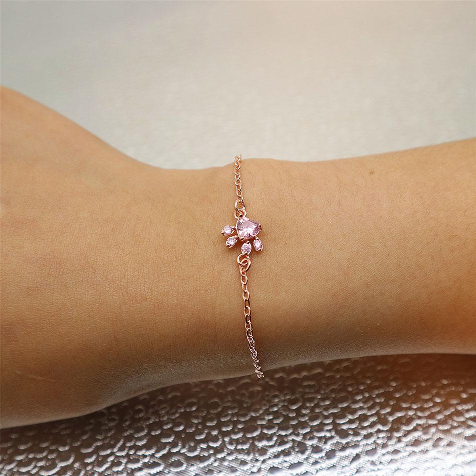 Rose Quartz Paw Print Bracelet for women, rose gold finish, ideal animal jewelry for pet enthusiasts