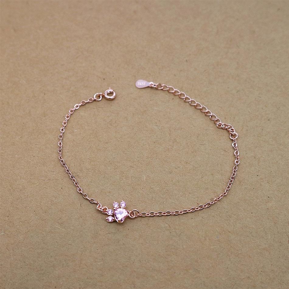 Pet themed rose quartz and rose gold paw print bracelet, hypoallergenic for sensitive skin wearers