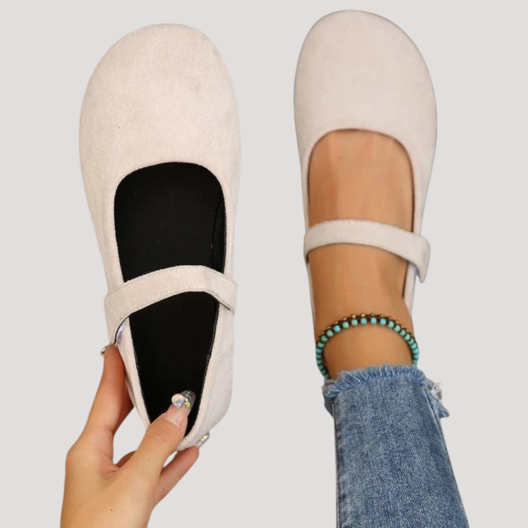 Women's round toe Mary Jane flats with Velcro strap for comfort and easy wear.