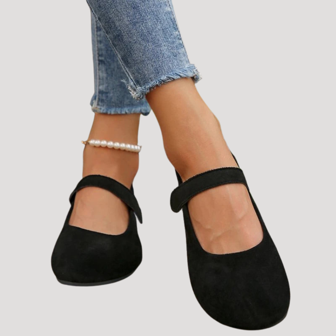 Comfortable women's Mary Jane flats with cushioned insoles, round toe, and secure Velcro strap.