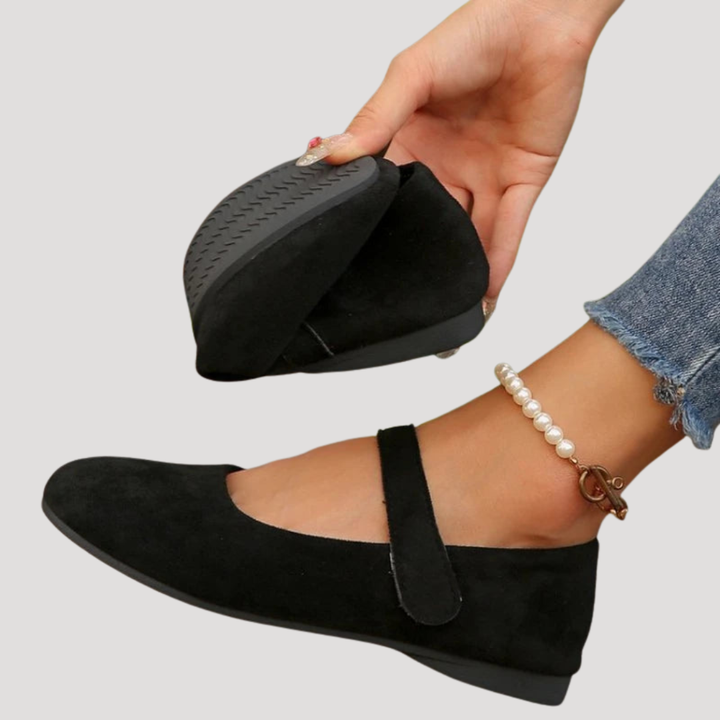 Easy-wear women's Mary Jane flats with a convenient Velcro strap closure and comfortable round toe design.