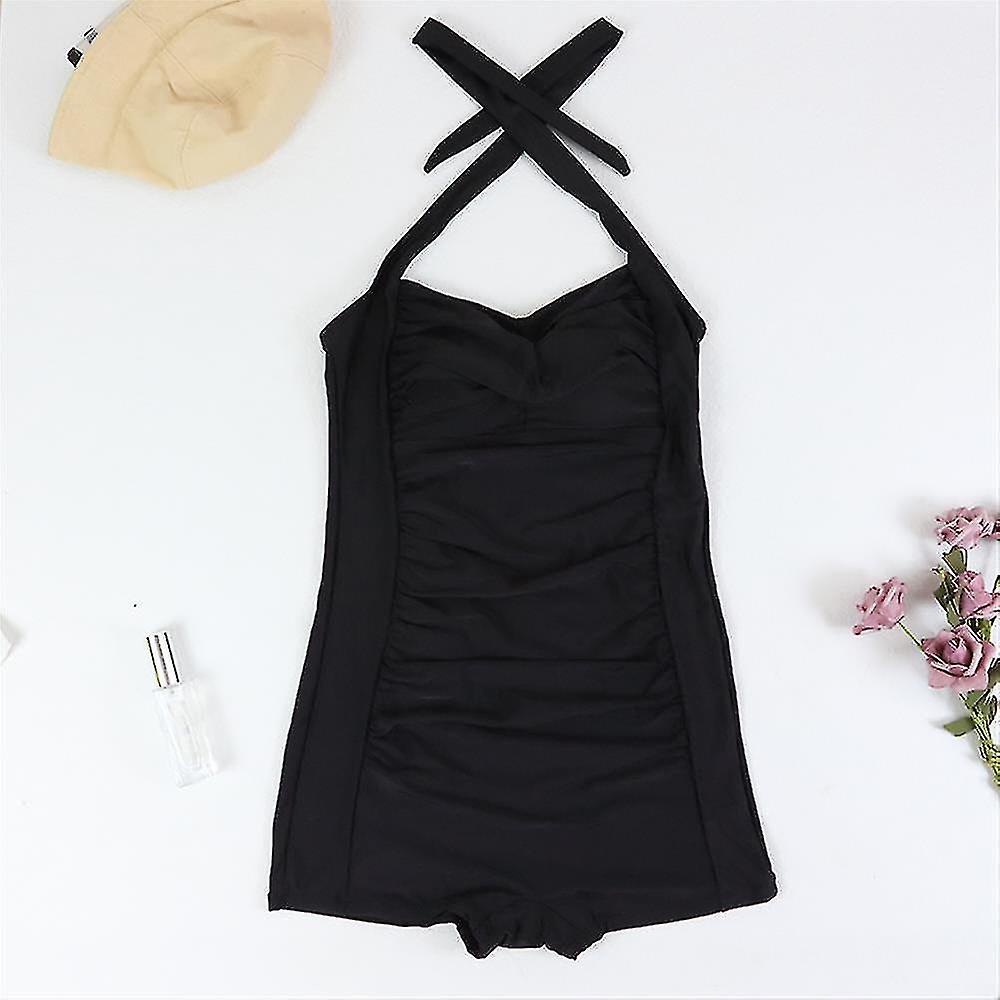 Close-up of ruched halter and sweetheart neckline on a women's boyleg one-piece swimsuit for summer.