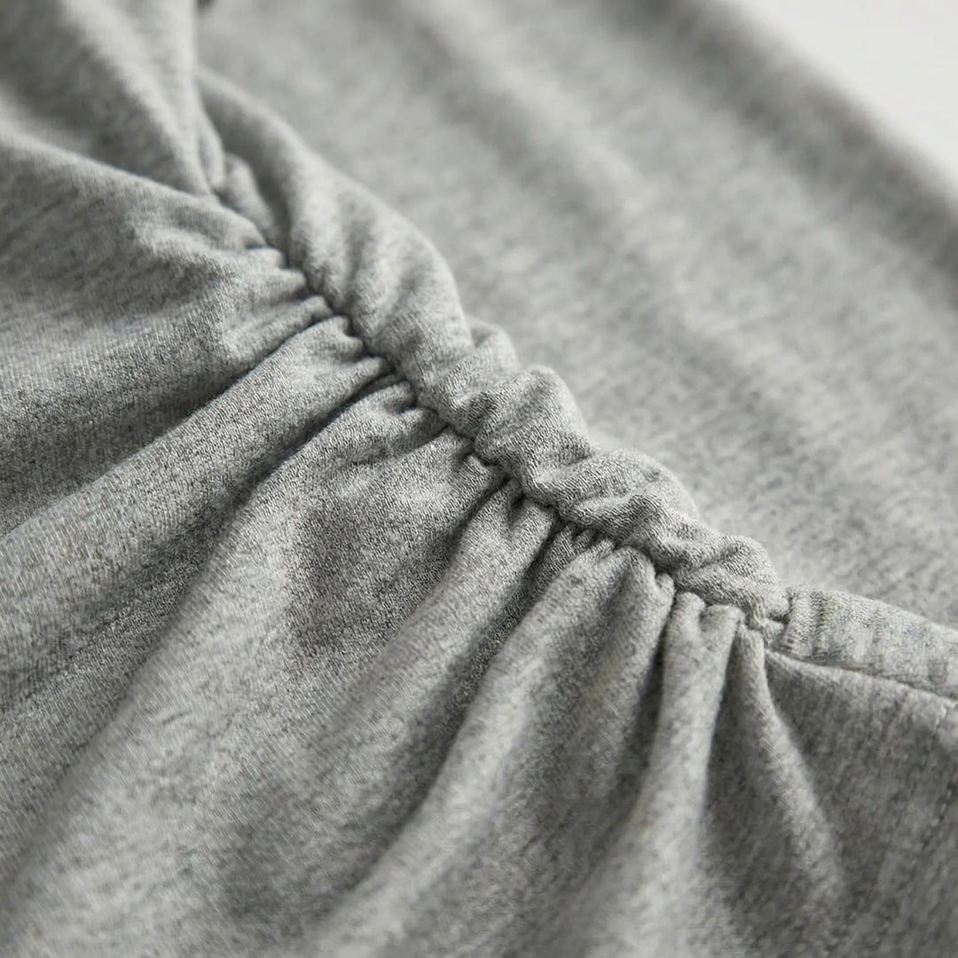 Elegant women's ruched long-sleeve top, a stylish pullover shirt perfect for versatile casual fashion.