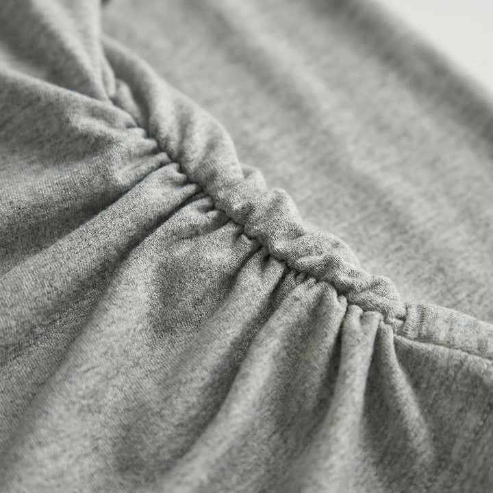 Elegant women's ruched long-sleeve top, a stylish pullover shirt perfect for versatile casual fashion.