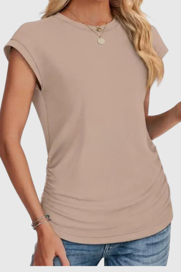 Relaxed fit women's tunic top with elegant ruched sides for versatile casual style.