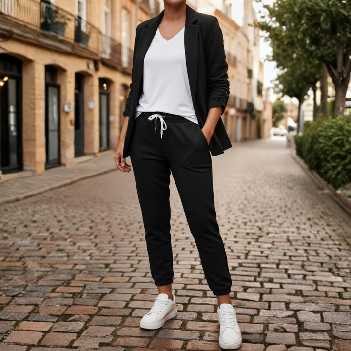 Elegant women's suit with a ruched sleeve blazer and soft joggers, a complete two-piece outfit set.