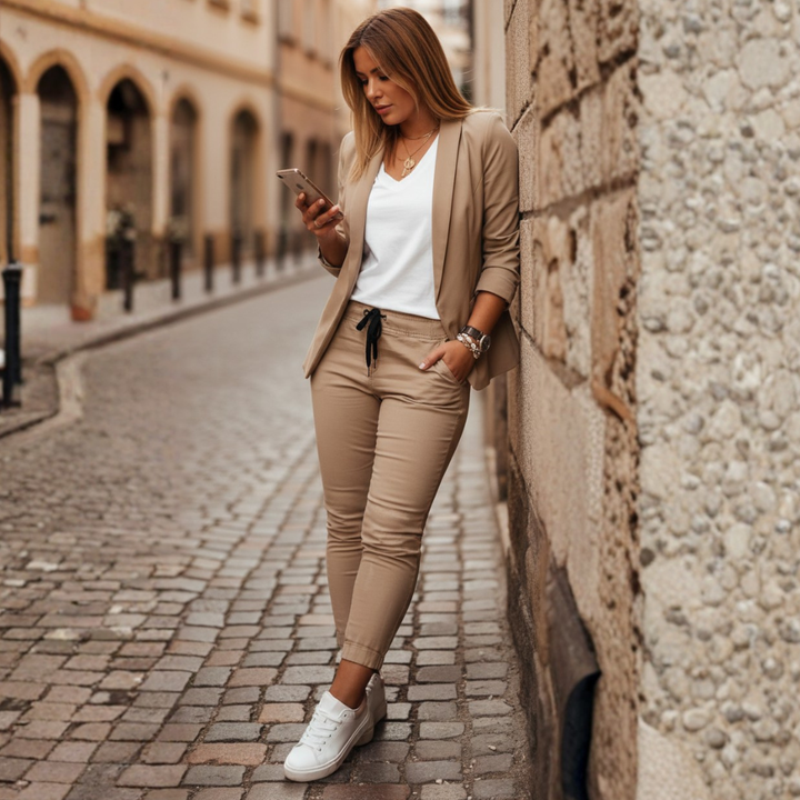 Stylish women's ruched sleeve blazer and jogger matching set, a comfortable and modern two-piece outfit.