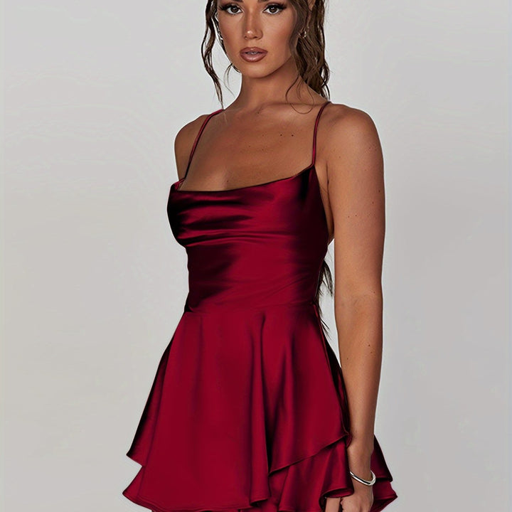 Elegant ruched tiered mini dress for women's cocktail events. With adjustable straps.