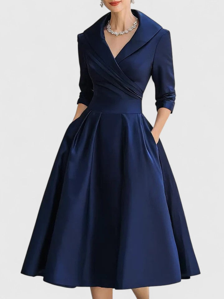 Sophisticated women's A-line midi dress for wedding guests, parties, or any special occasion. Modest elegance.