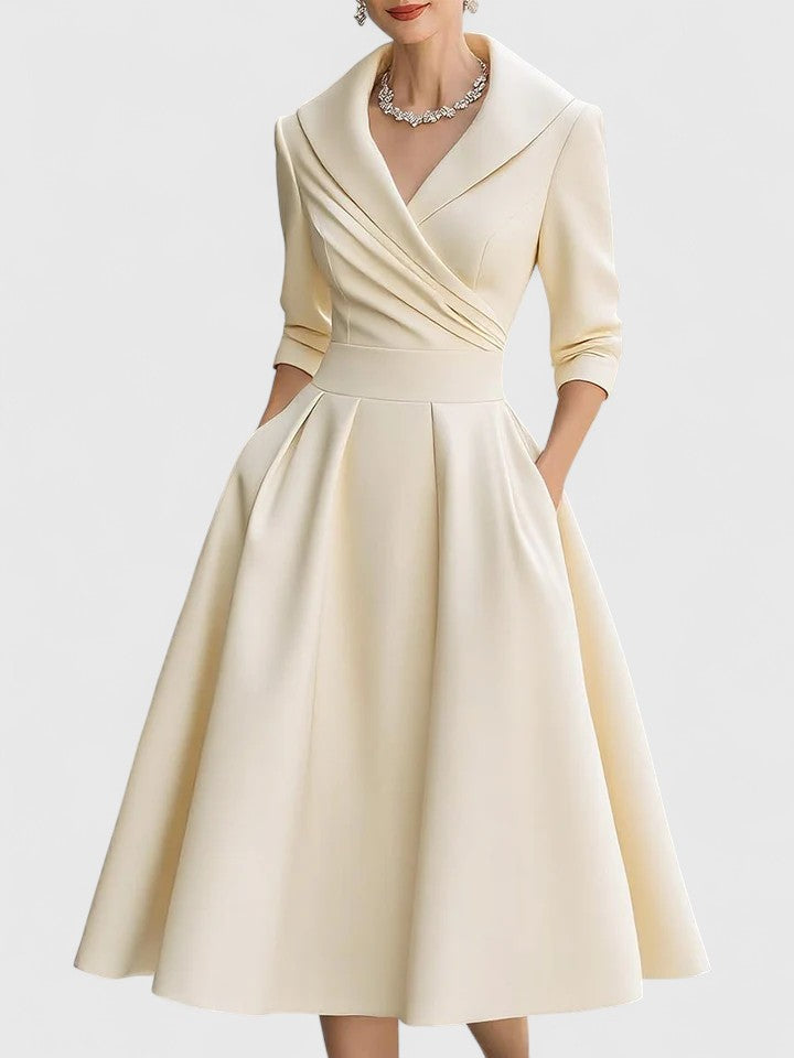 Comfortable yet stylish A-line midi dress for women. Ruched wrap collar adds an elegant, flattering fit.