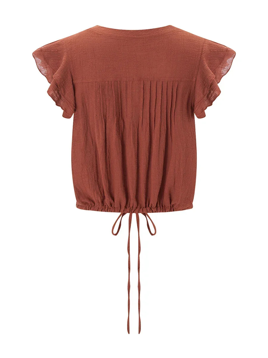Women's ruffle crop top, perfect airy beachwear and vacation style for summer.