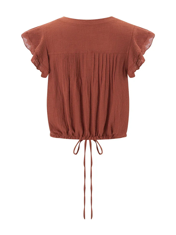 Women's ruffle crop top, perfect airy beachwear and vacation style for summer.