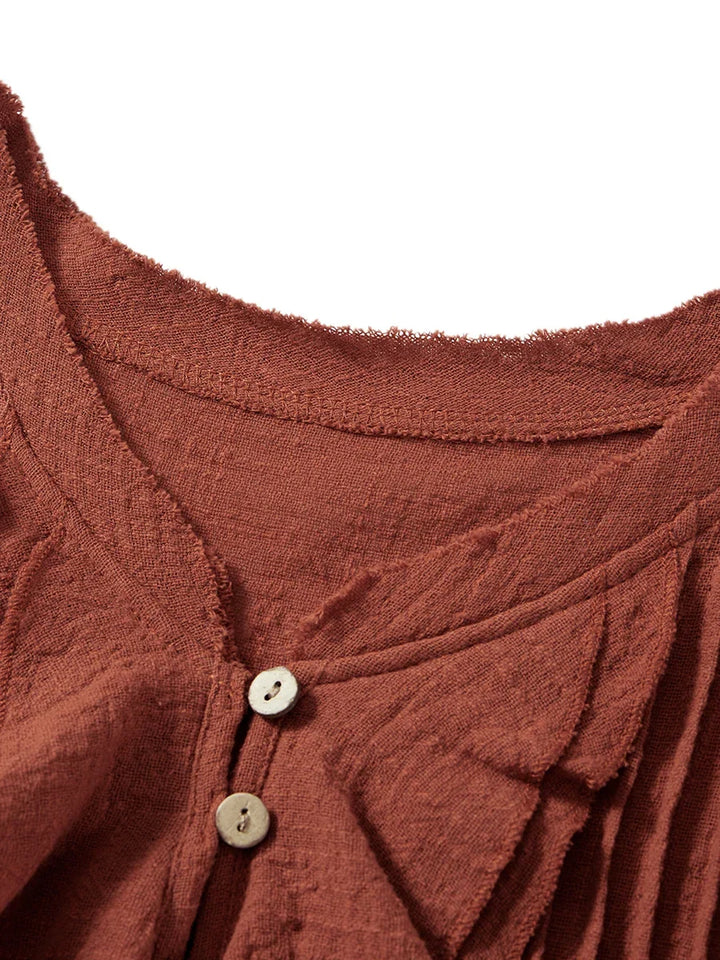 Trendy cropped women's top with playful ruffle front, ideal for summer casual & beach.