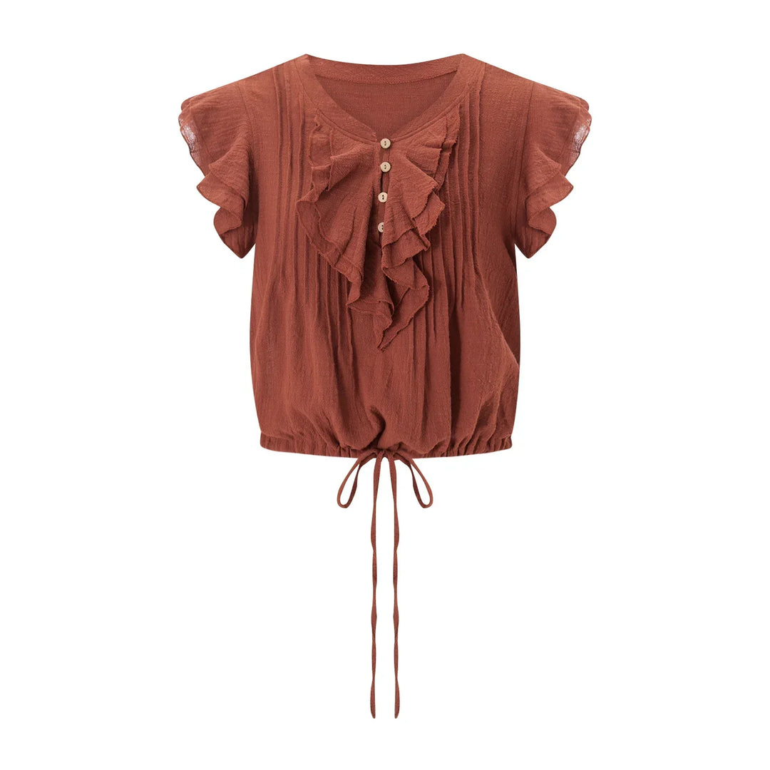 Women's ruffle front crop top with an airy beach-inspired summer design.