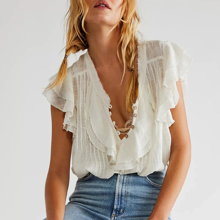 Lightweight women's ruffle crop top, perfect for airy summer comfort & beachwear.