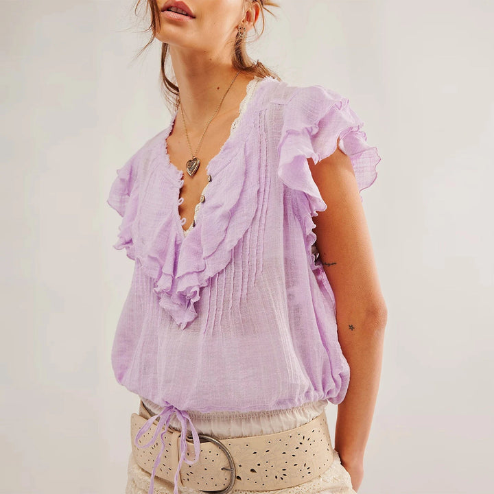 Airy women's ruffle crop top, a perfect summer fashion statement for beach days.