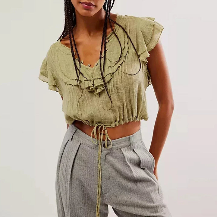 Cropped women's ruffle front top for an airy beach or vacation summer look.