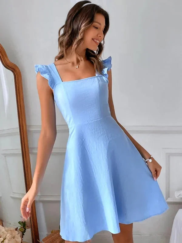 A-line mini dress for women, showcasing ruffle straps, a chic square neck & a delicate bow back detail.
