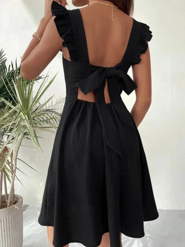 Chic women's mini dress, an A-line cut with ruffle straps, square neck, and a lovely bow at the back.