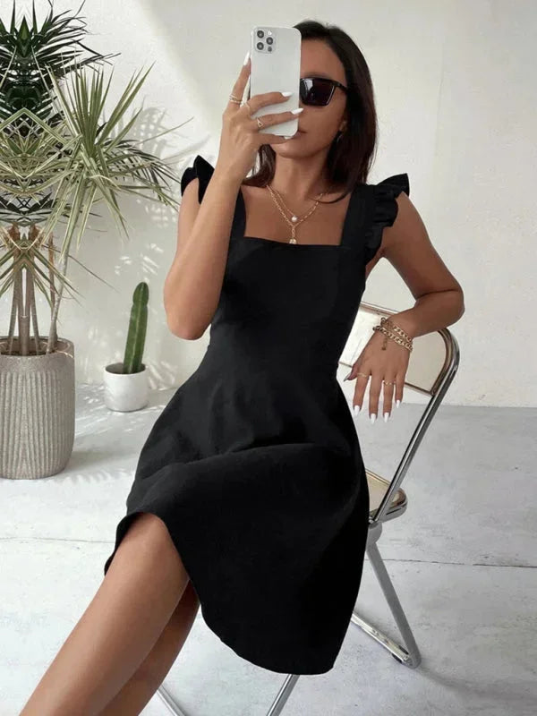 Women's fashionable square neck mini dress with delicate ruffle straps & a charming bow back design.