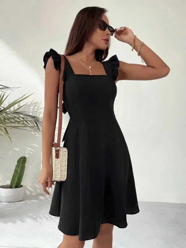 Feminine A-line summer mini dress for women, with ruffle straps, square neck, and a delightful bow back.