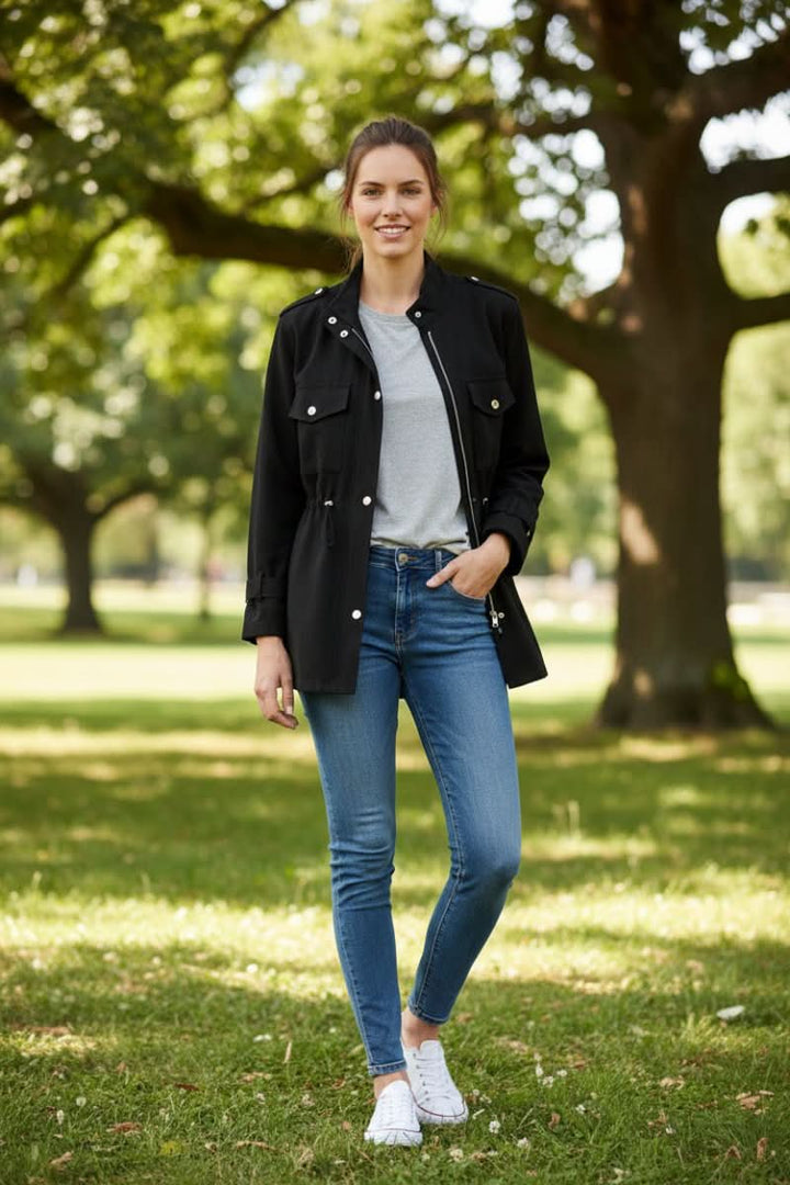 Rugged women's utility jacket for versatile outerwear. Features a trendy open back design for modern street style.