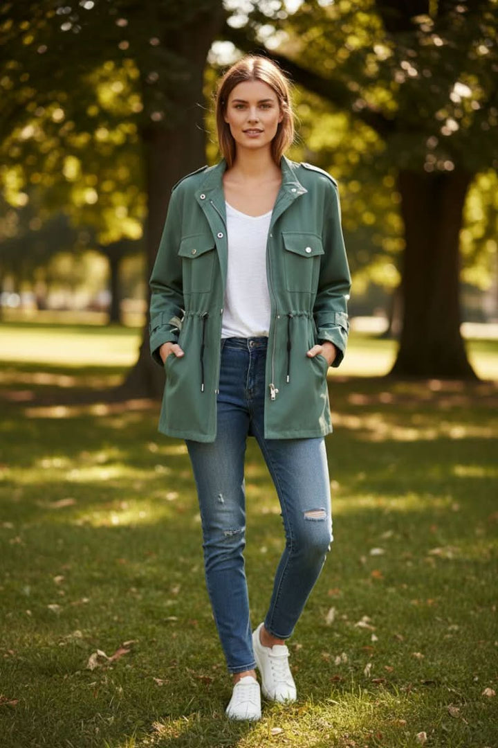 Casual women's rugged utility jacket. Features a distinctive open back, ideal for modern fashion & street style.