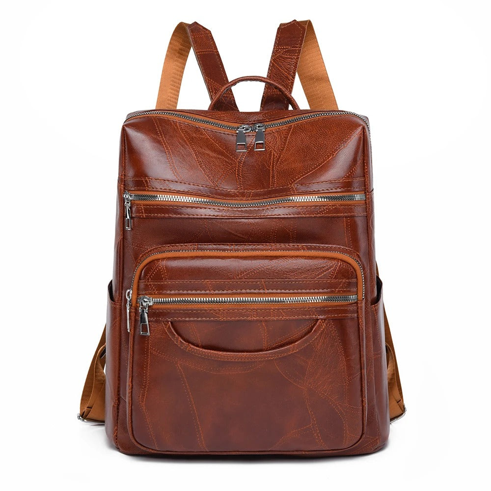 Chic black leather Sade backpack for women, a versatile bag offering elegant everyday fashion & essentials carry.