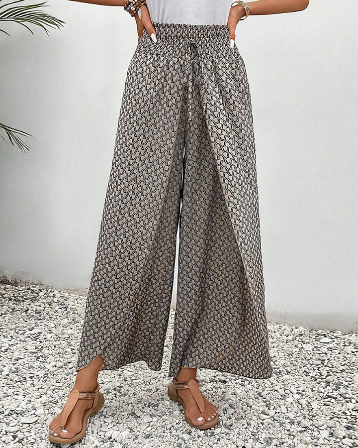 Chic women's Sahara wide-leg pants. Relaxed fit for versatile casual style, perfect for effortless spring & summer fashion.