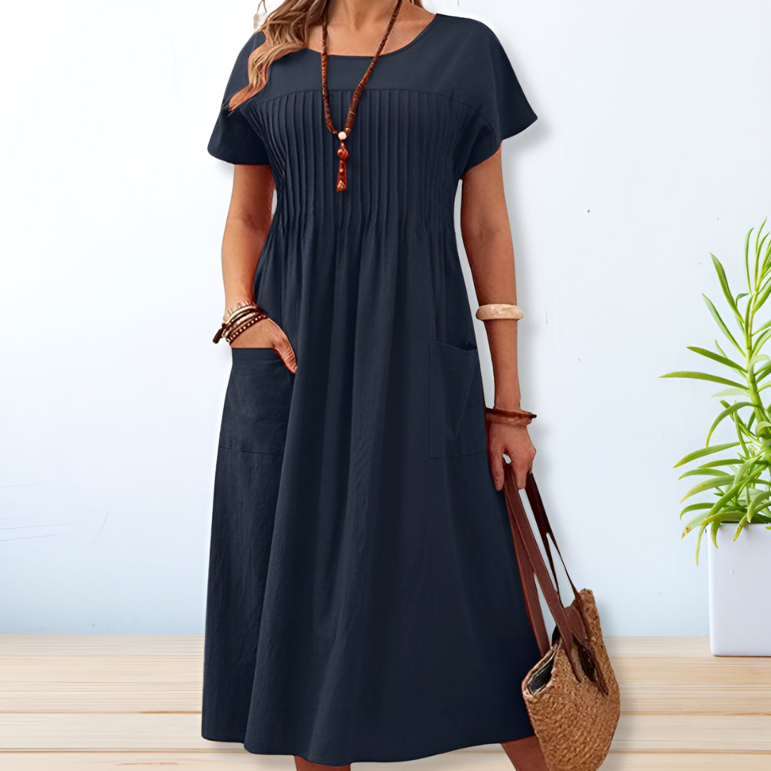 Comfortable women's Savannah short sleeve midi day dress. Relaxed fit, chic, & versatile for everyday spring & summer fashion.