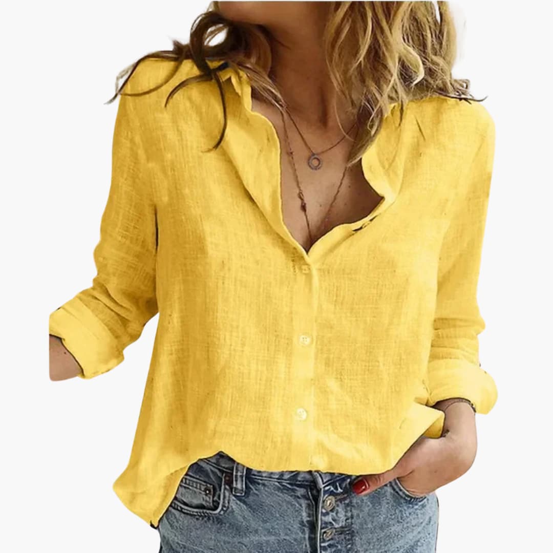 Smart casual women's shirt featuring a chic scallop collar and roll-tab sleeves. Relaxed fit for style.