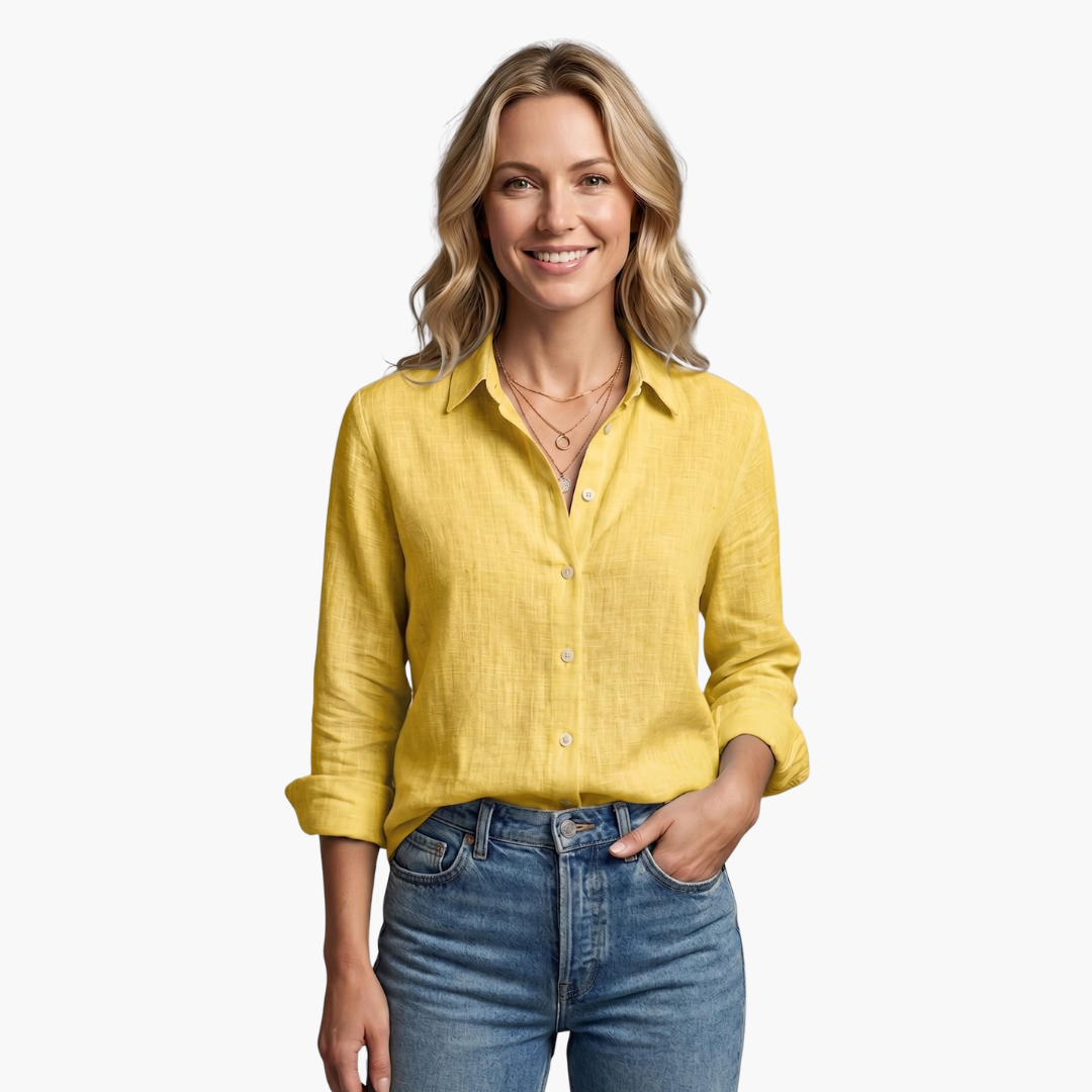 Women's button-down blouse with distinctive scallop collar. Long roll-tab sleeves, relaxed for comfort.
