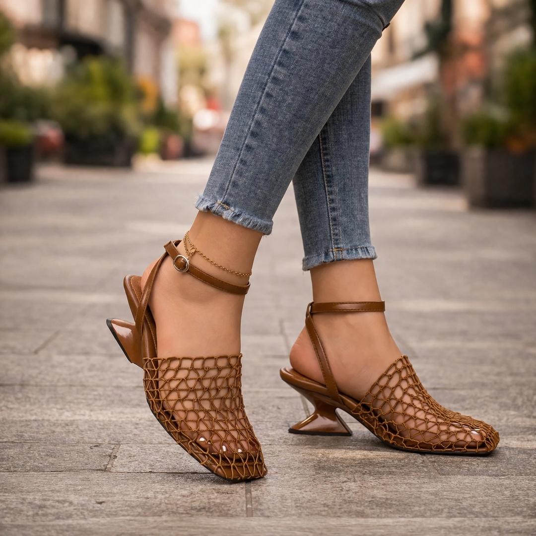 Women's sculpted heel strappy sandals in elegant design. Perfect dress shoes with an ankle strap.