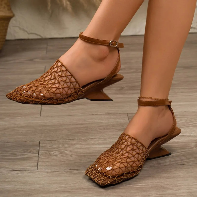 Women's sculpted heel fashion sandals. Strappy design with an ankle strap & pointed toe. Versatile heels.