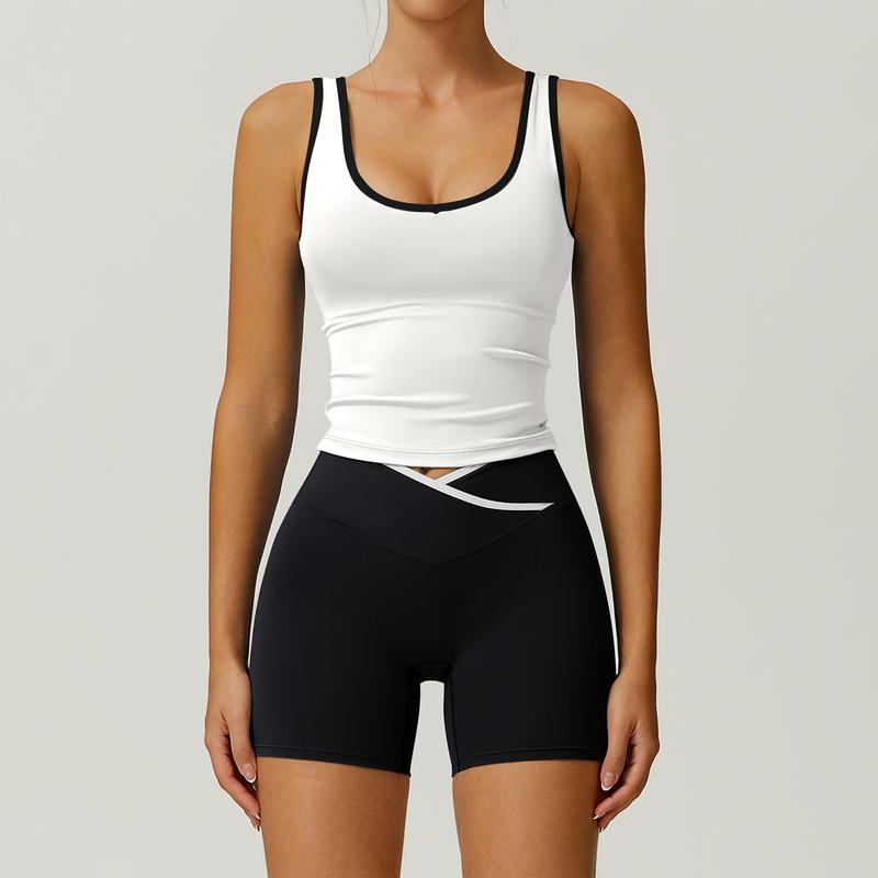 Women's sculpting activewear set with tank top & high-waist shorts for gym workouts.