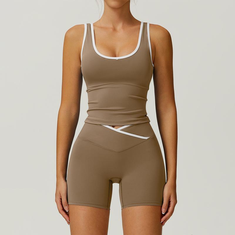 Women's fitness set: sculpting activewear tank & high-waist shorts for intense workouts.
