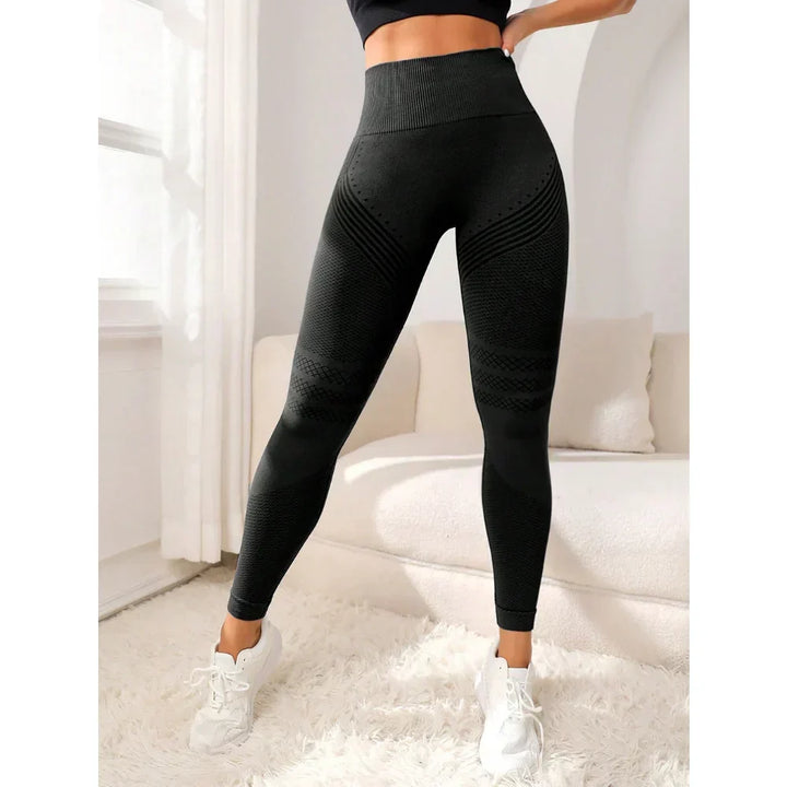 Flattering women's booty-lifting leggings. Seamless high-waist design ensures comfort & style for fitness.