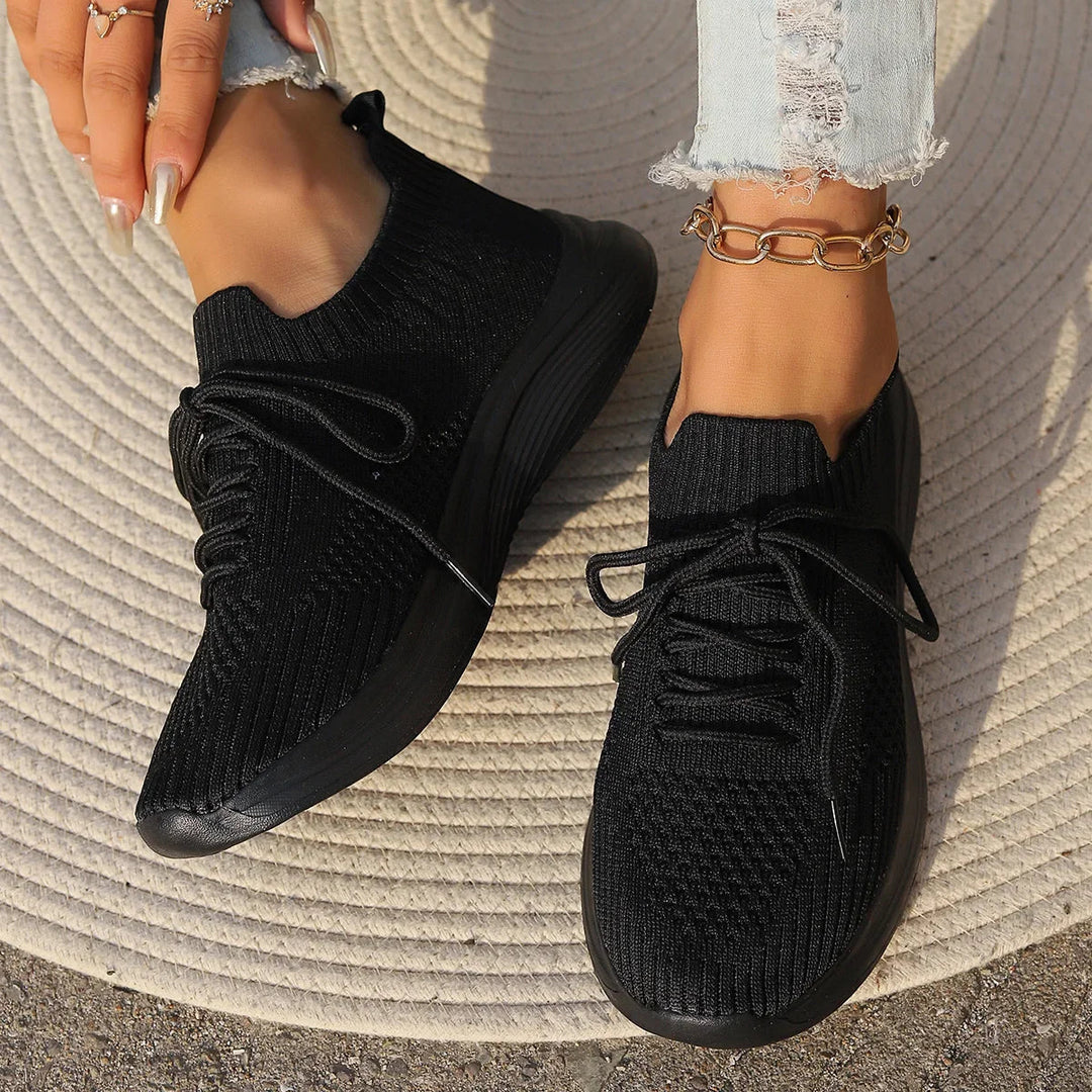 Modern women's seamless lace-up sneakers, perfect for casual street style & versatile comfort.