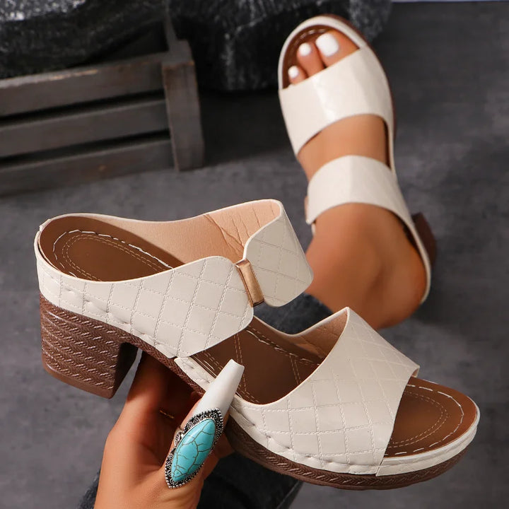Stylish women's Shara block heel sandals, crafted from high-quality leather, ideal for summer outfits.